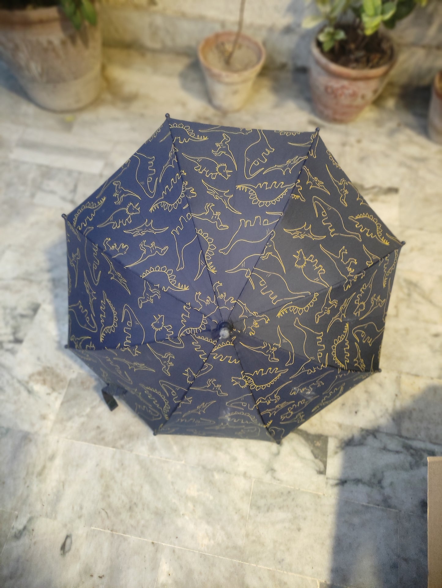 NAVY BLUE COLLAPSIBLE UMBRELLA WITH A DINOSAURE PRINT
