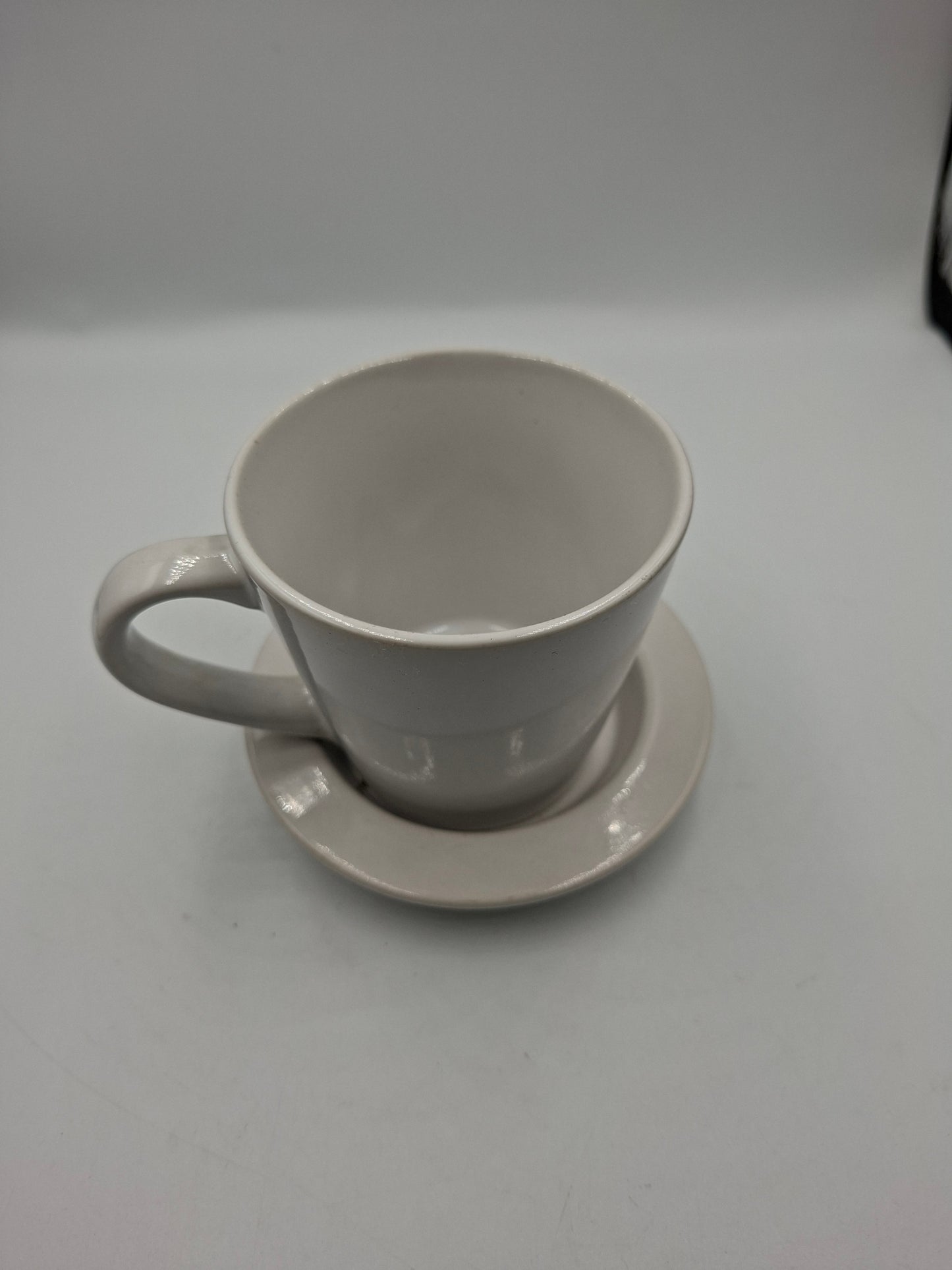 COFFEE MUG AND SAUCER