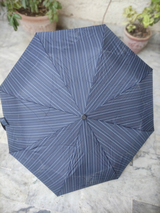 MOONBAT DUNAMIS FOLDING UMBRELLA WITH A STRIPED PATTERN