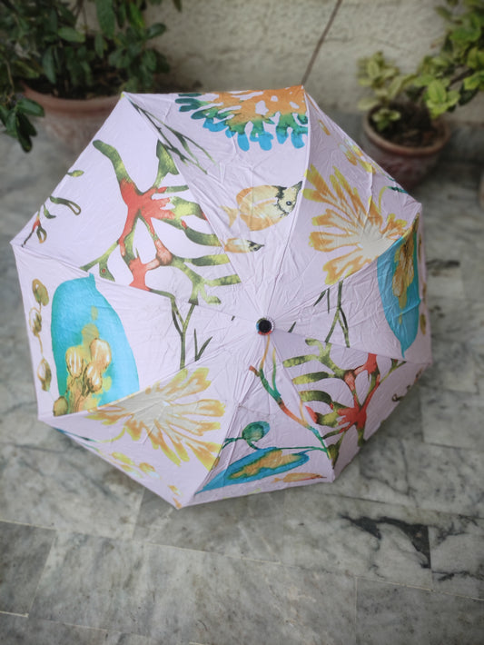 FOLDING UMBRELLA WITH A MULTI COLOUR FLOWER PATTERN