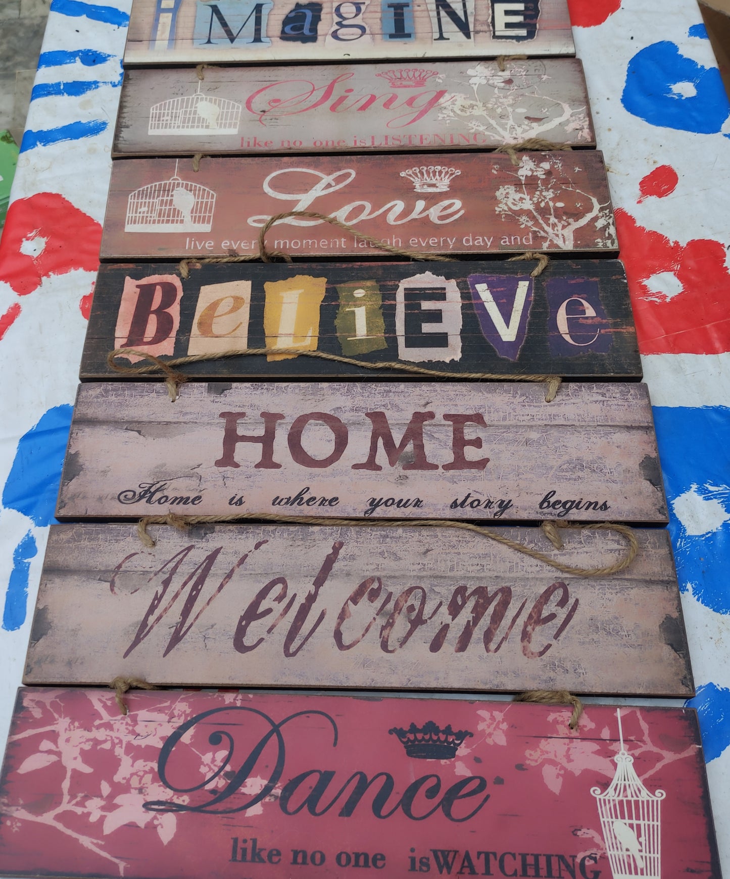 IMAGE DISPLAYS A DECORATIVE WOODEN WALL SIGN