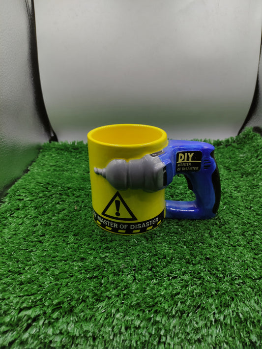 YELLOW CERAMIC COFFE MUG WITH A DRILL SHAPED